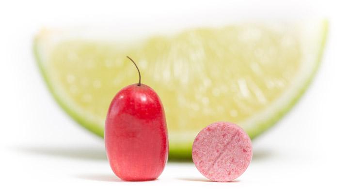 Miracle berry tablet next to a lime